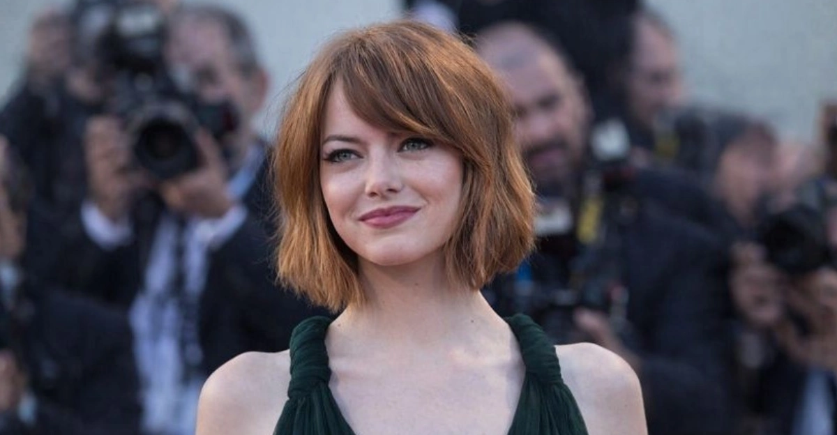 Classic short bob haircut with soft bangs and a natural, face-framing shape.