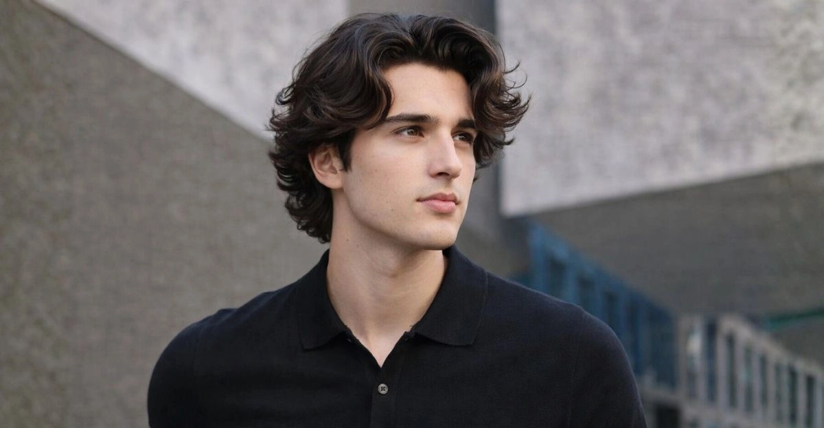 Bro flow hairstyle with medium-length layers flowing back to soften a wide forehead.