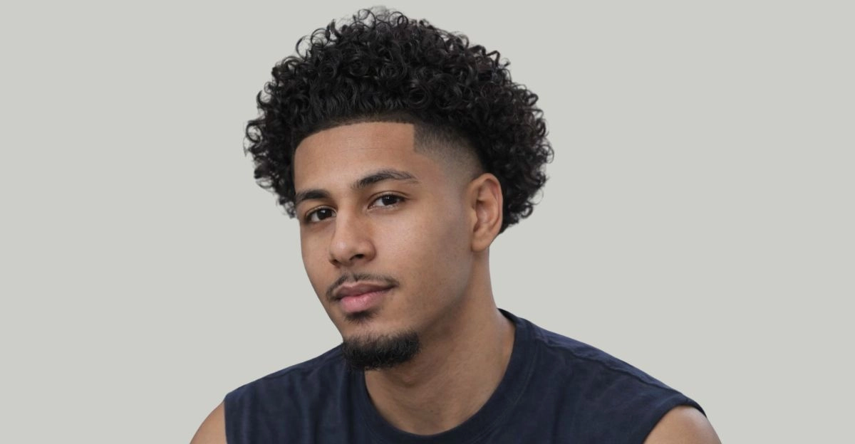 Short high taper fade haircut with even top and tight faded sides for a bold look.