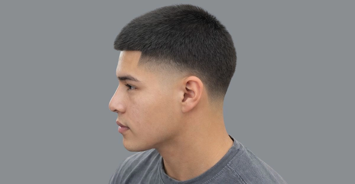 Short high taper fade haircut with even top and tight faded sides for a bold look.